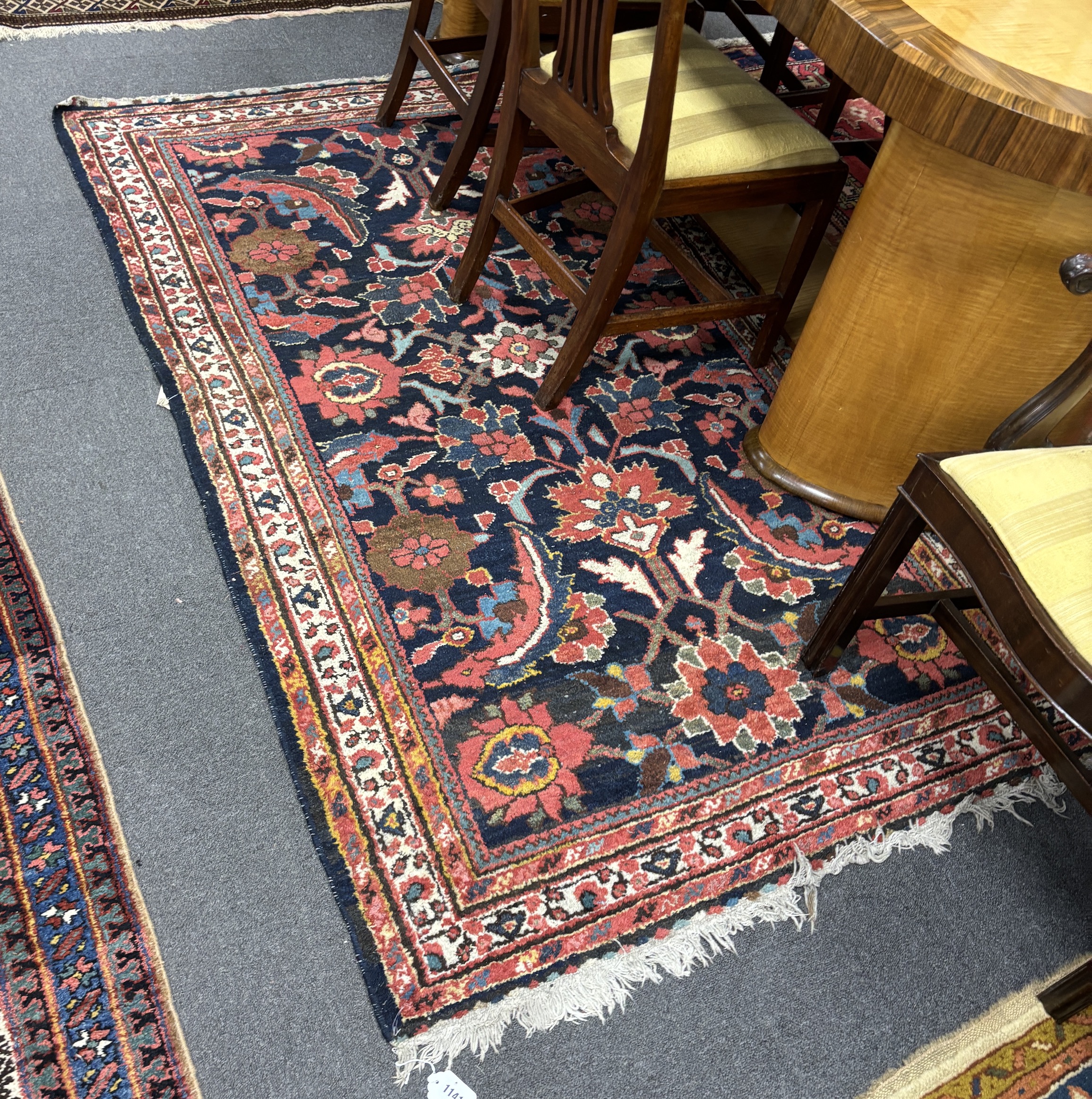 An Afghan blue ground rug, 200 x 126cm